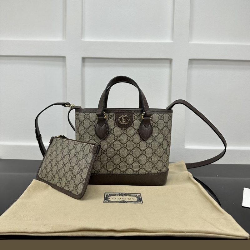 G*u*i shopping bags